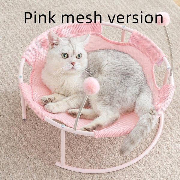 Cat lying on a pink mesh pet hammock with text 'Pink mesh version'.