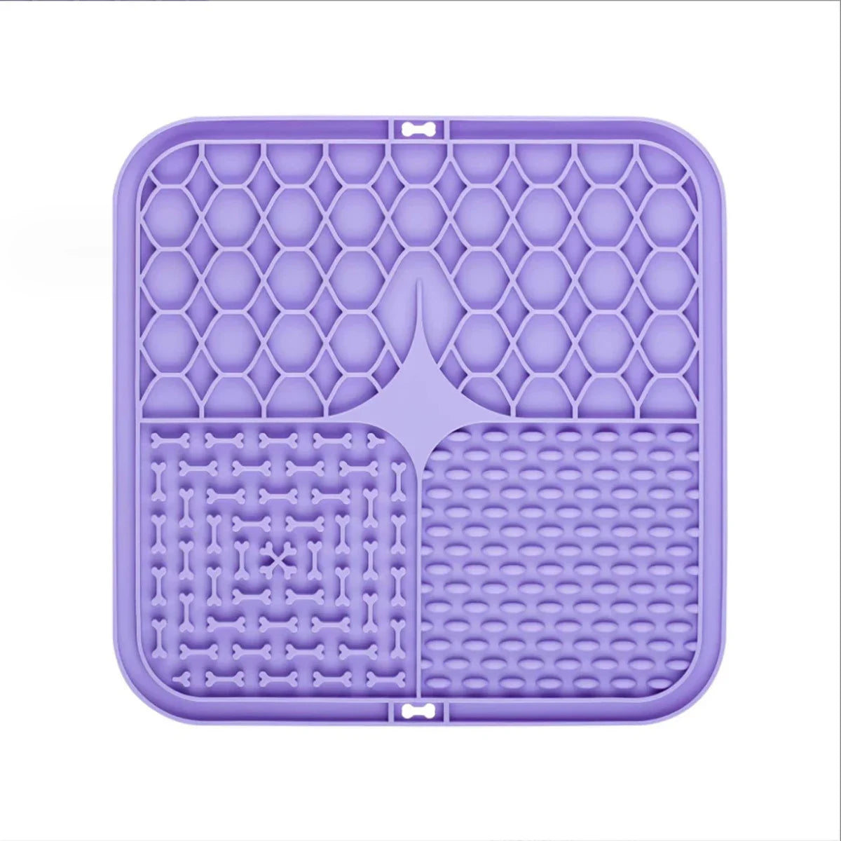 Purple silicone mat with textured design on a white background