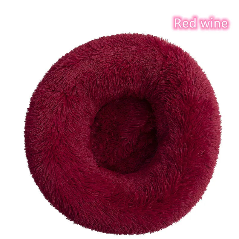 Calming round plush pet bed for cats and dogs, washable and warm