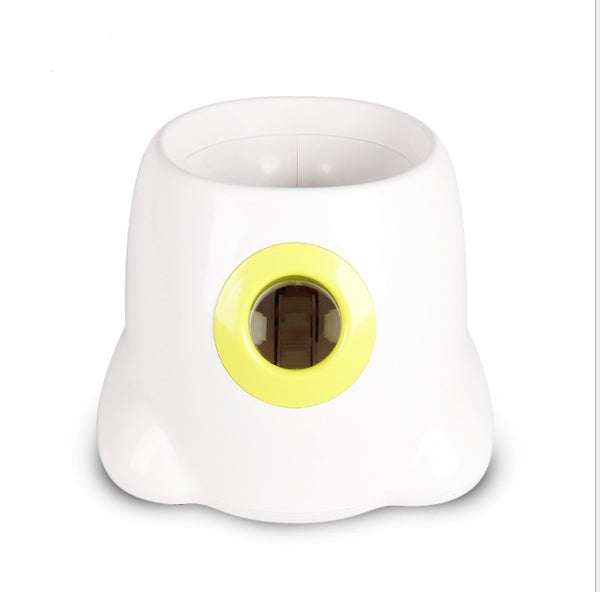 White electronic device with a yellow circular component on a white background