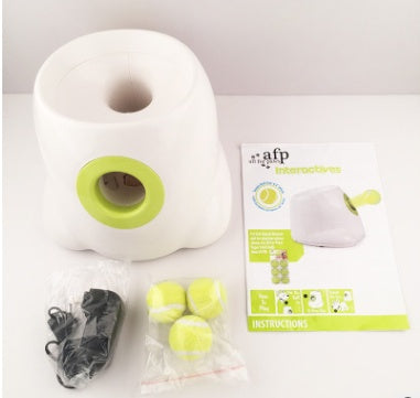 White pet toy with green accents and packaging on a white background