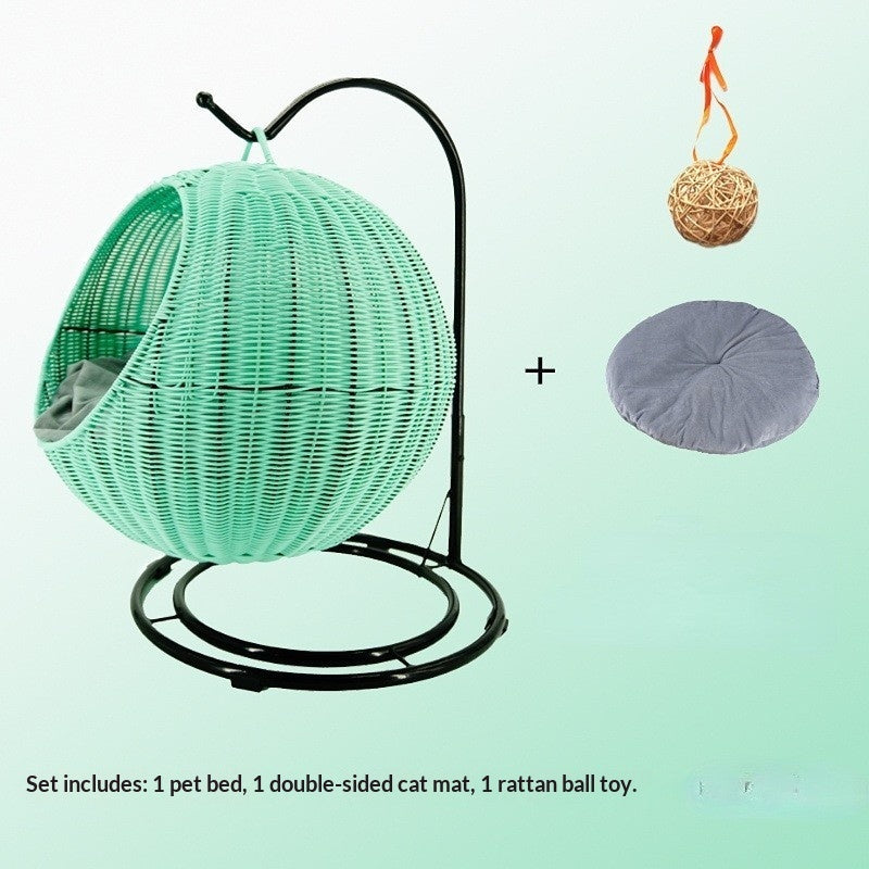 Green woven pet bed with stand, rattan ball toy, and purple mat on a light green background.
