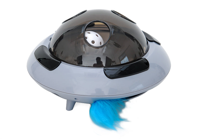 Futuristic-looking device with a blue feather on a white background