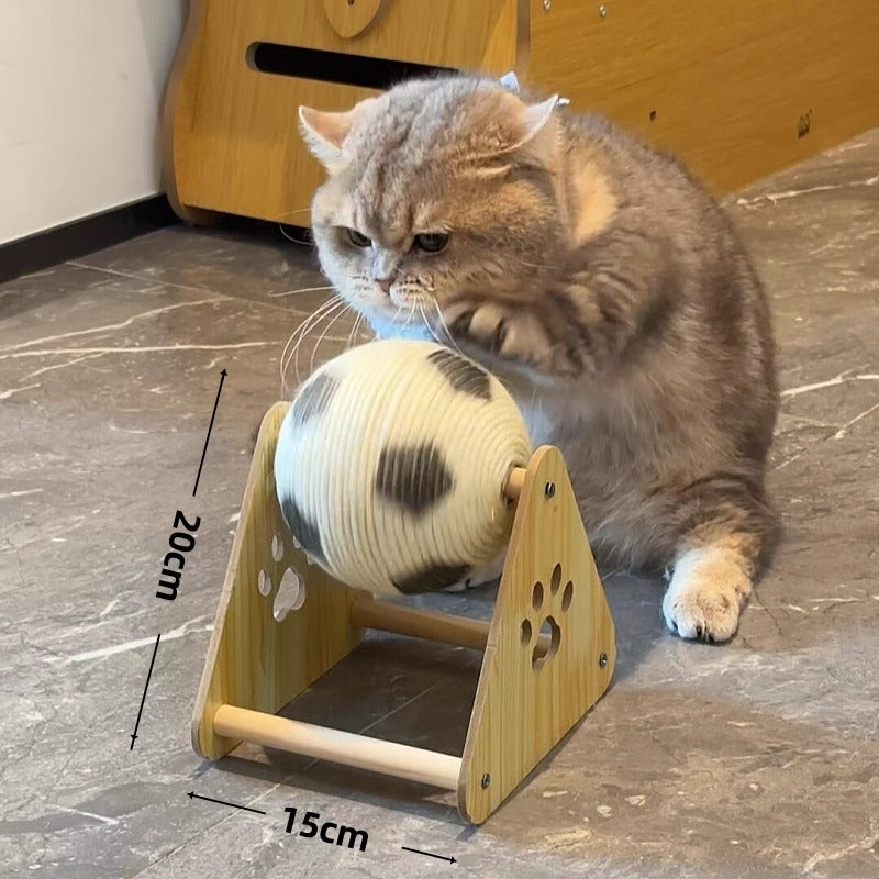 Cat playing with a wooden toy on a marble floor