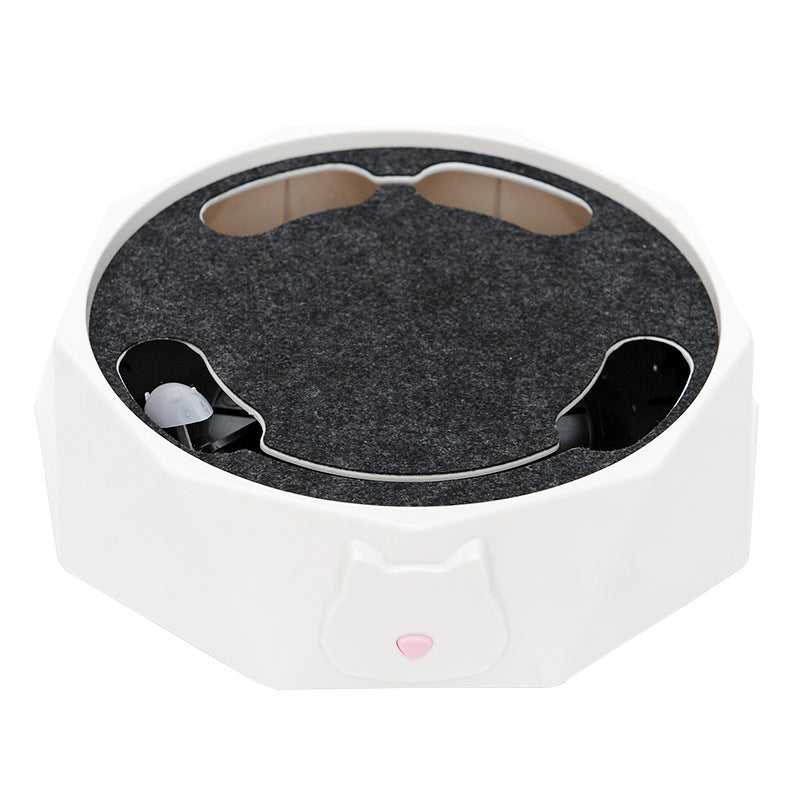 White electronic device with a dark gray circular component on a white background