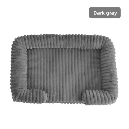 Dark gray pet bed with ribbed texture on a white background