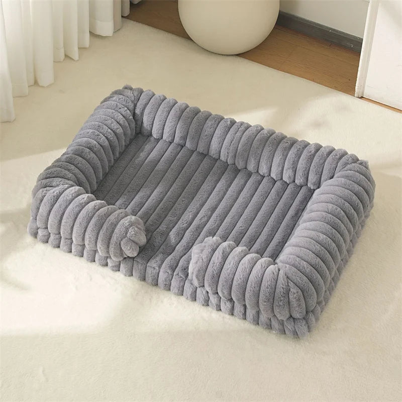 Gray pet bed on a light-colored floor