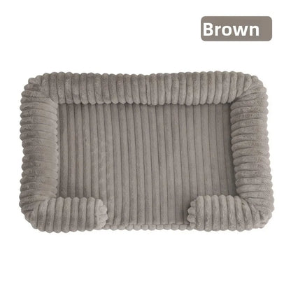Brown textured pet bed on a white background