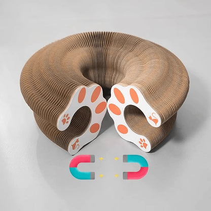 Cardboard cat toy with paw design on a gray background