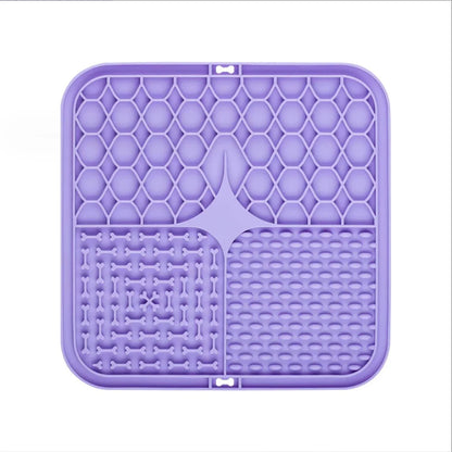 Purple silicone mat with textured design on a white background
