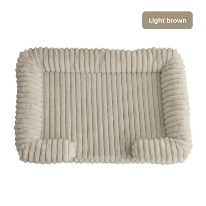 Light brown textured pet bed on a white background