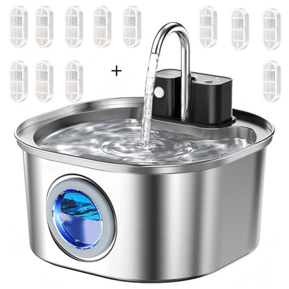 Stainless steel pet water fountain with water flowing out, surrounded by water filter cartridges.