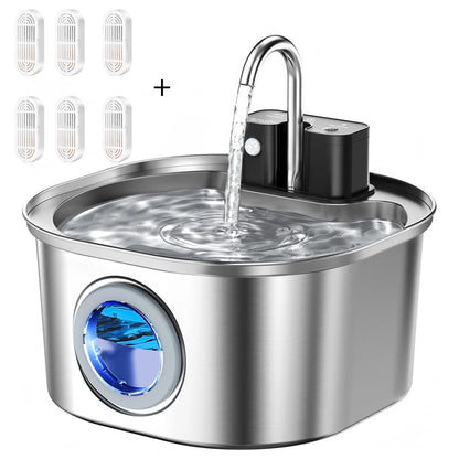 Stainless steel pet water fountain with water flowing, surrounded by water filter cartridges on a white background.