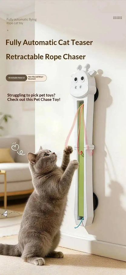 Cat playing with a fully automatic cat teaser toy in a home setting.