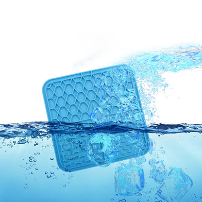 Blue ice cube tray floating on water with ice cubes around