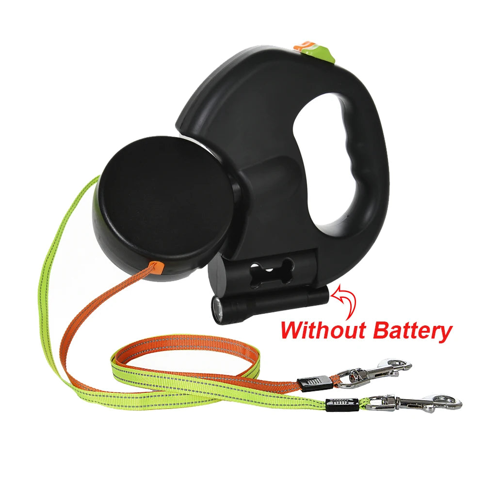 Black retractable dog leash with green and orange strap on a white background
