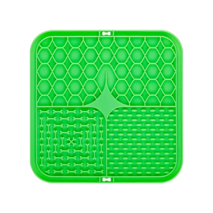 Green silicone mat with textured design on a white background