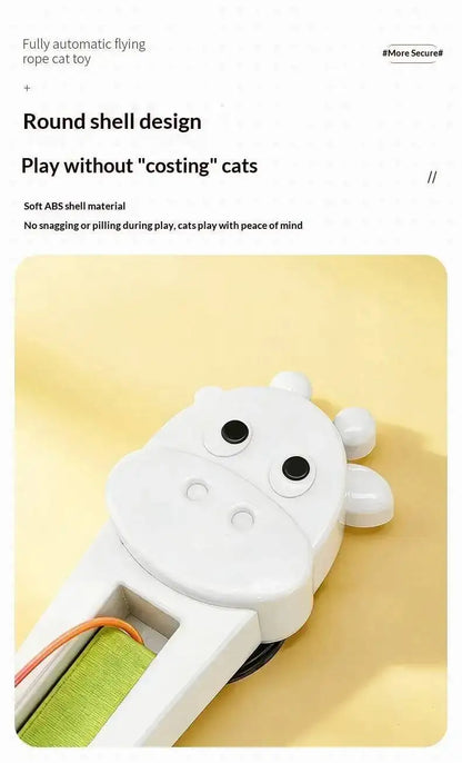 A close-up product photo of a white cat-shaped rope cat toy on a pale yellow background, with marketing text above describing the round shell design and soft ABS material.
