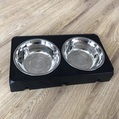 Double stainless steel dog bowls on black elevated feeder stand for home use