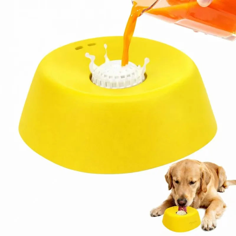 Yellow dog bowl with a white base, being filled with orange liquid, and a dog eating from a yellow bowl.