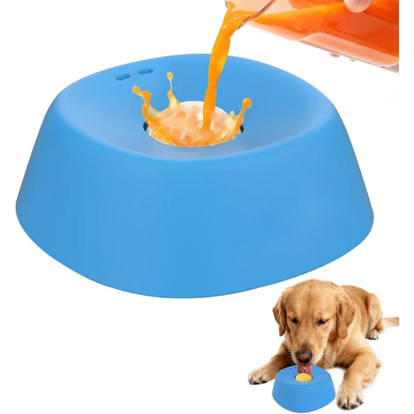 Blue dog bowl with orange liquid being poured into it, next to a dog holding a blue toy.