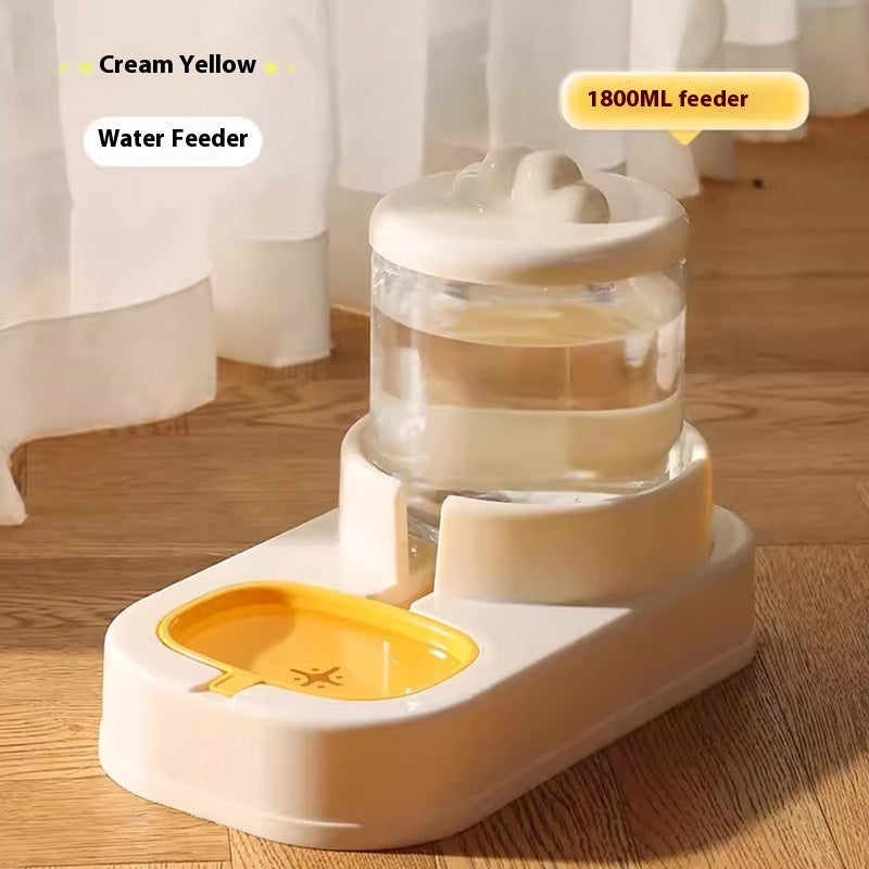 Cream yellow water feeder with 1800ML capacity on a wooden floor.