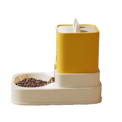 Pet feeder with a yellow top and beige base on a white background