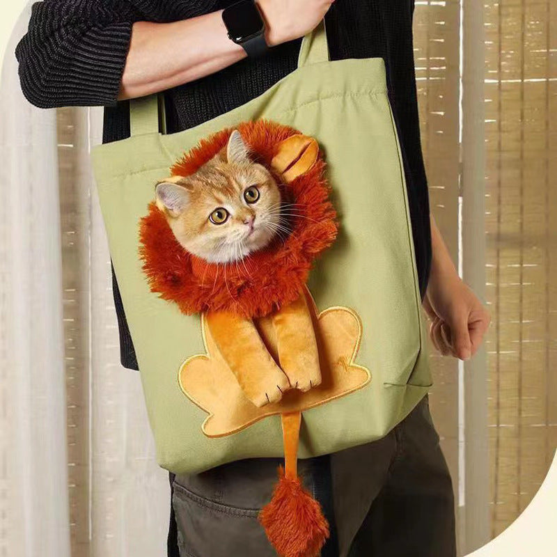 Person holding a green tote bag with a cat in a lion costume design.