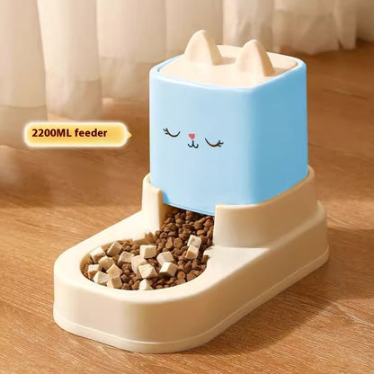 Pet feeder with a cartoon face on a wooden floor